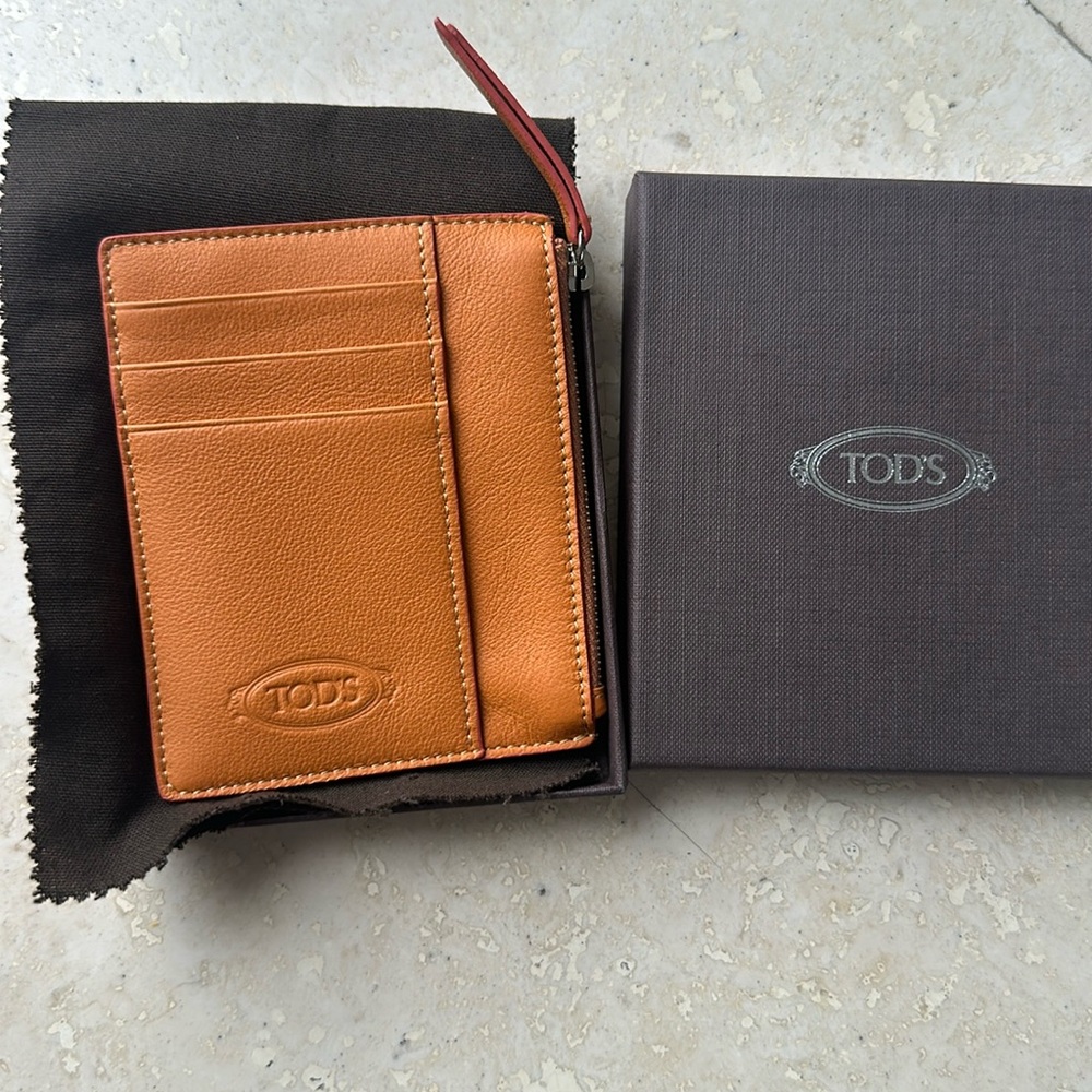 Tods card holder wallet costumized . Never worn